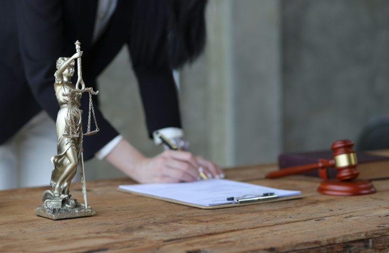 Concept of justice and legal judgment. Signing a legal contract agreement.