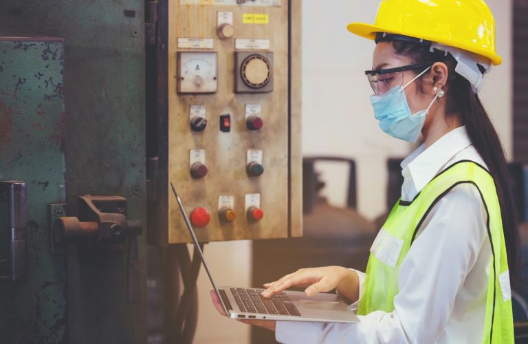 Industrial factory maintenance engineers woman inspect relay protection system of machinery and hold
